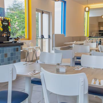 a room with tables and chairs