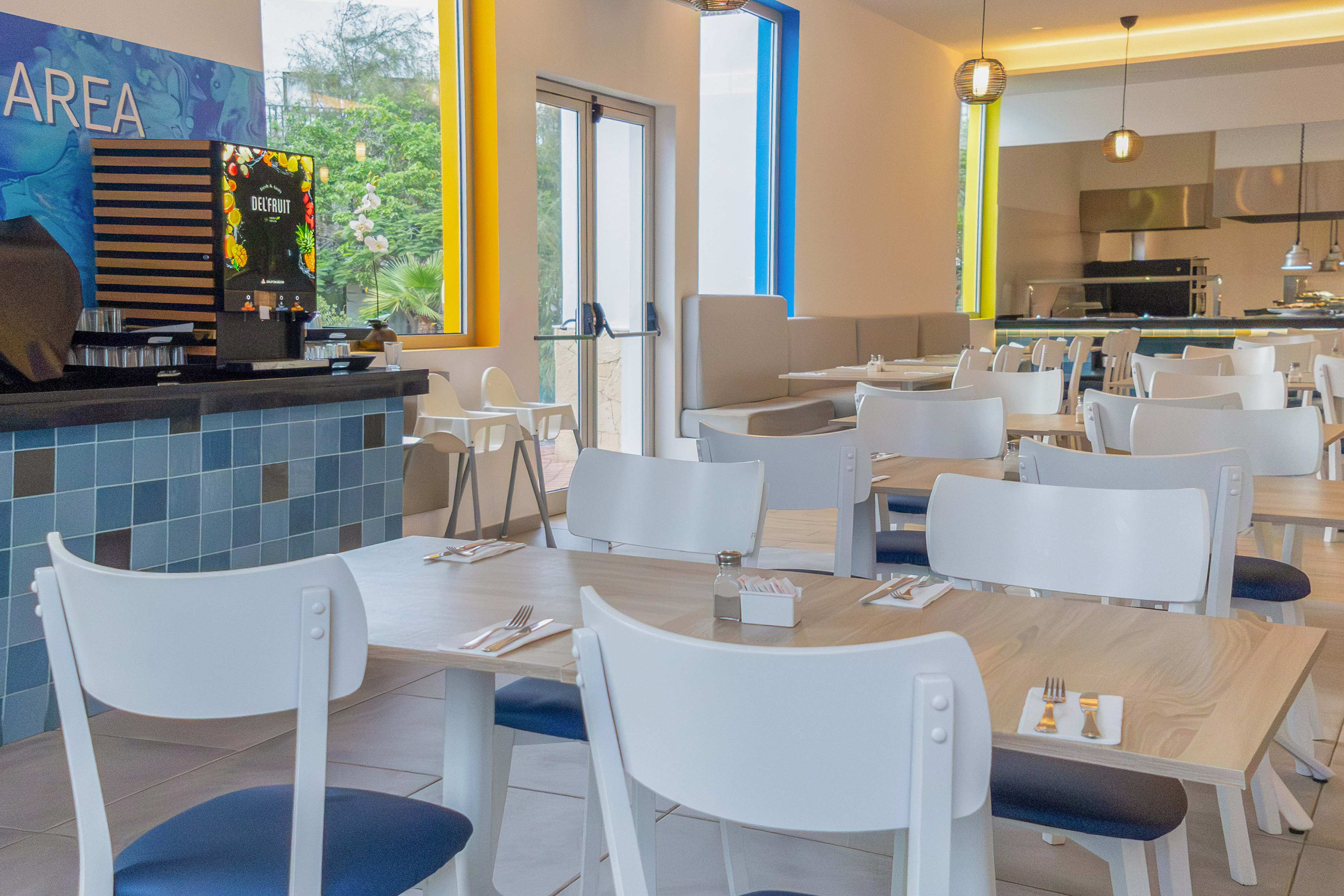 a room with tables and chairs