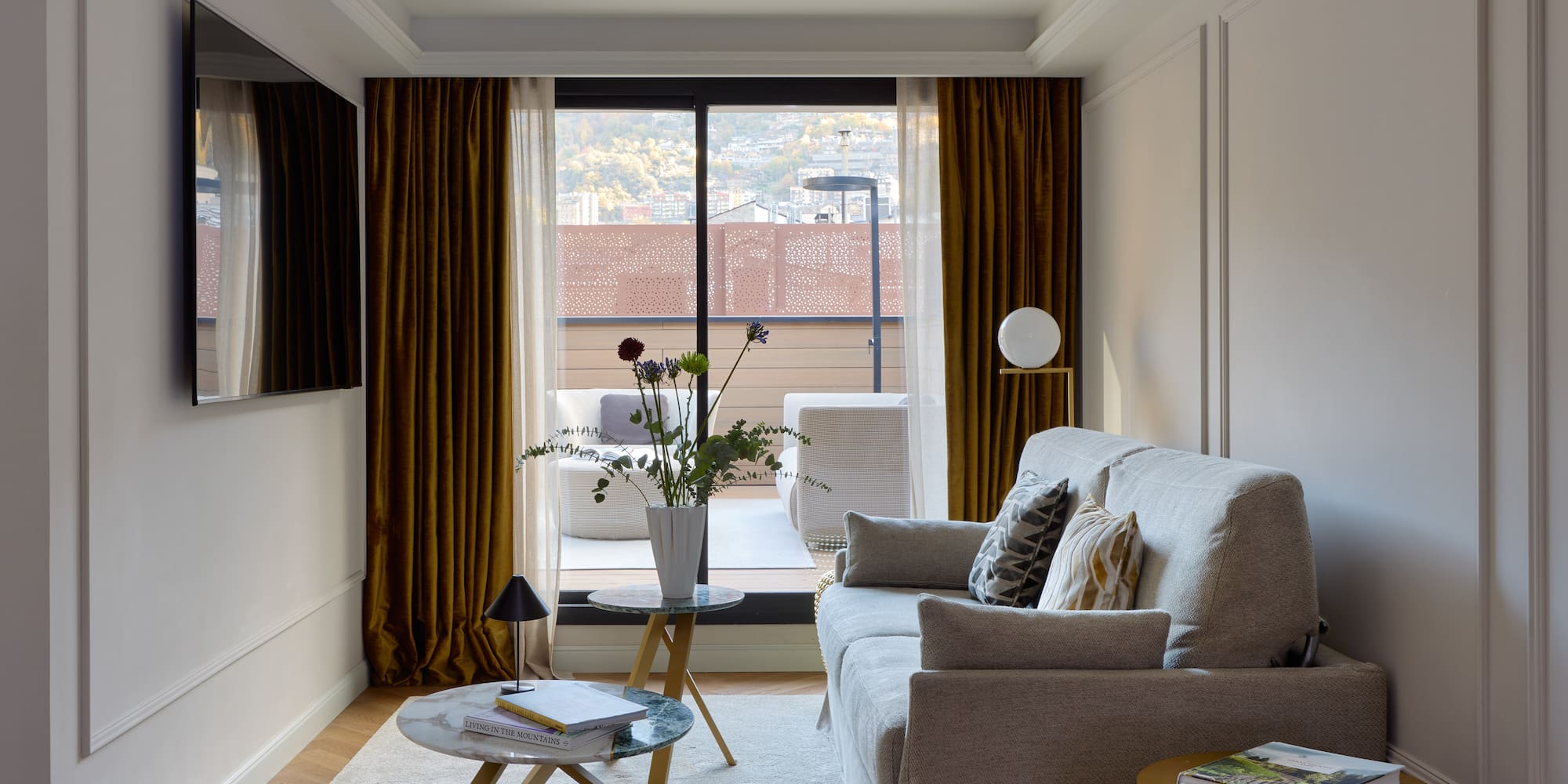 a living room with a couch and a table