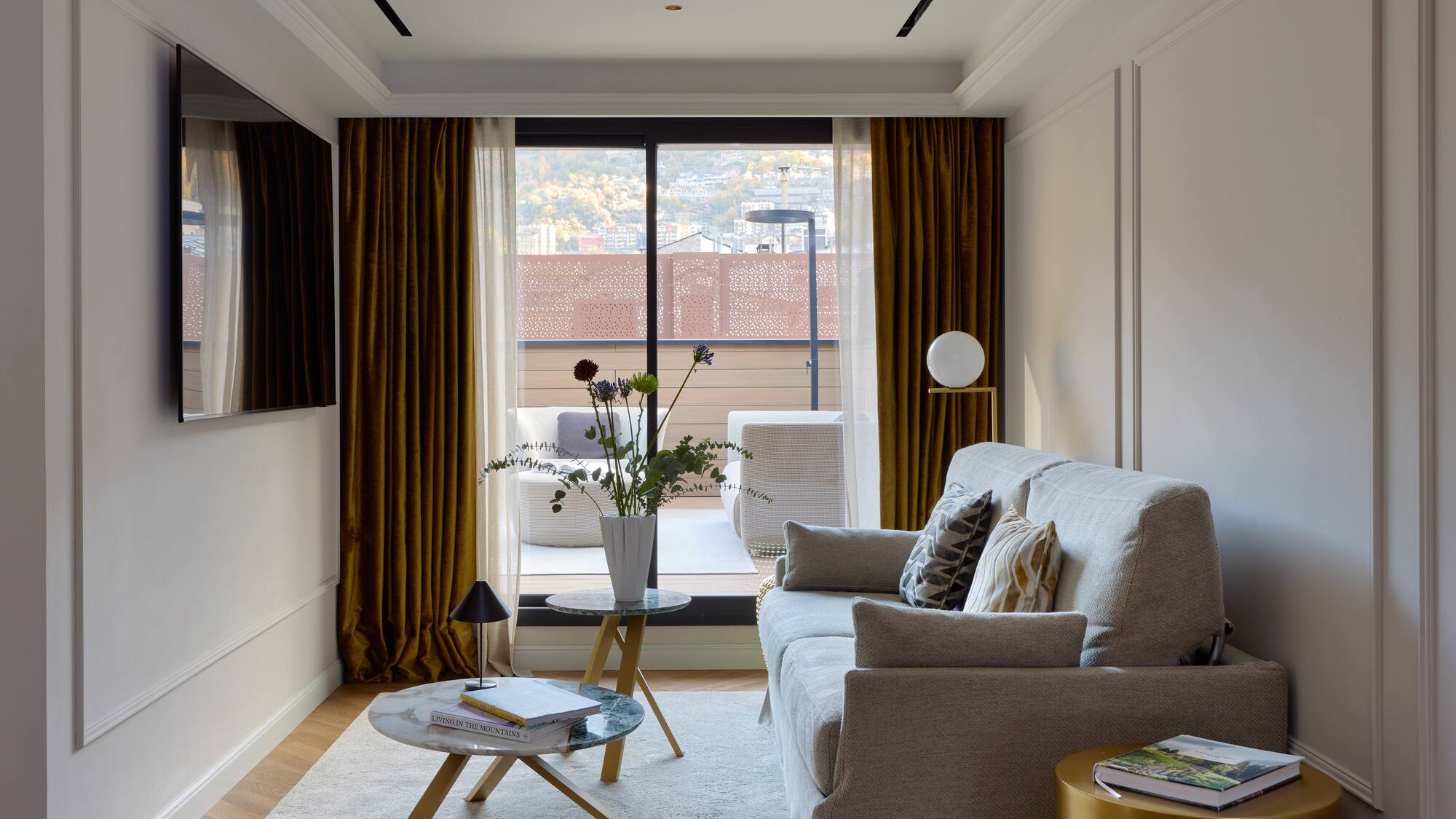 a living room with a couch and a table