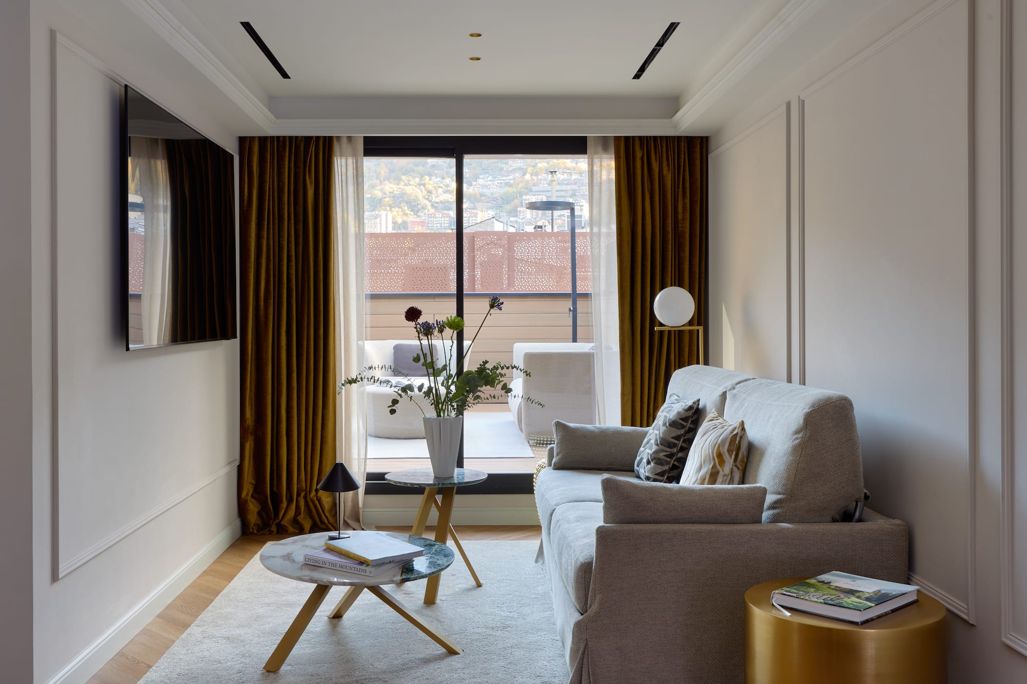 a living room with a couch and a table
