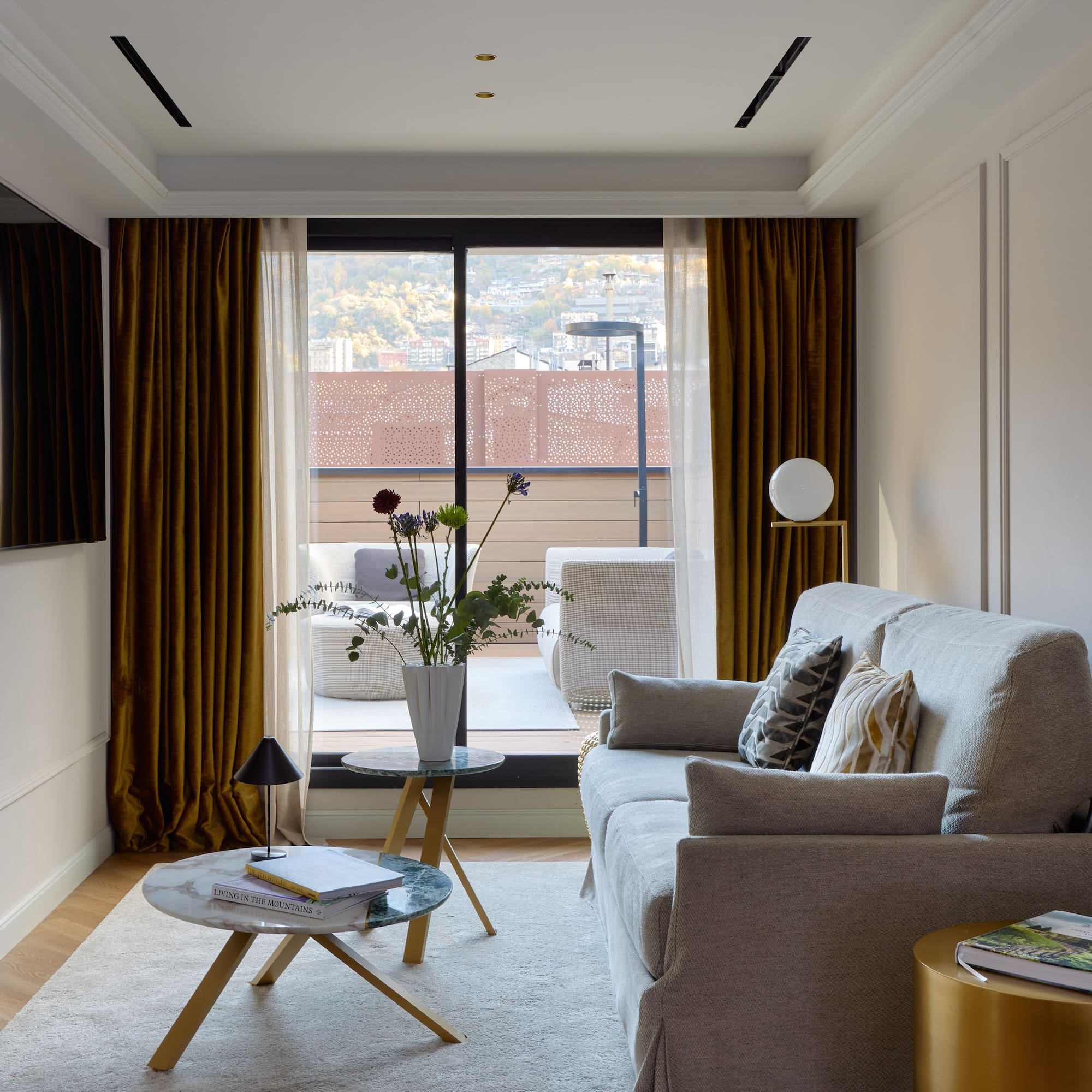 a living room with a couch and a table