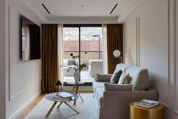 a living room with a couch and a table