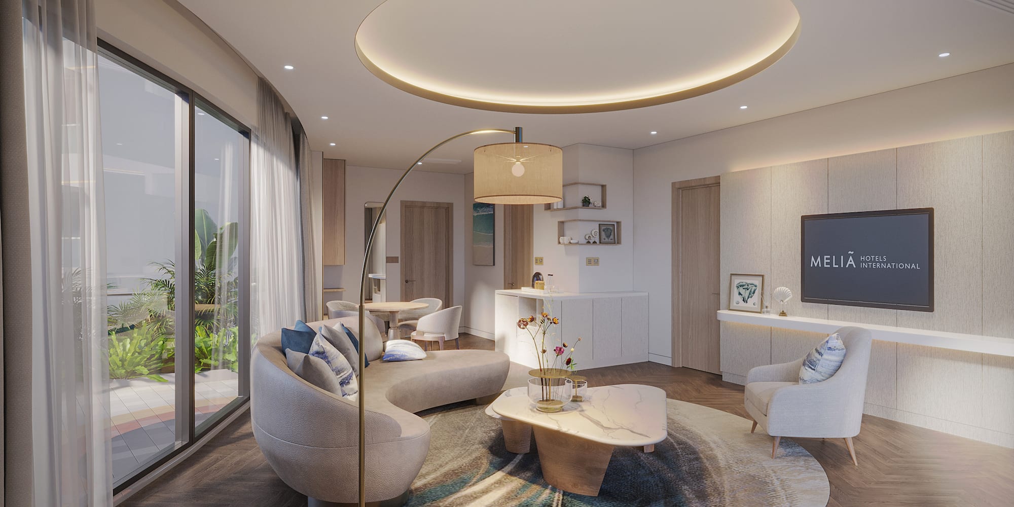 a living room with a round table and couches