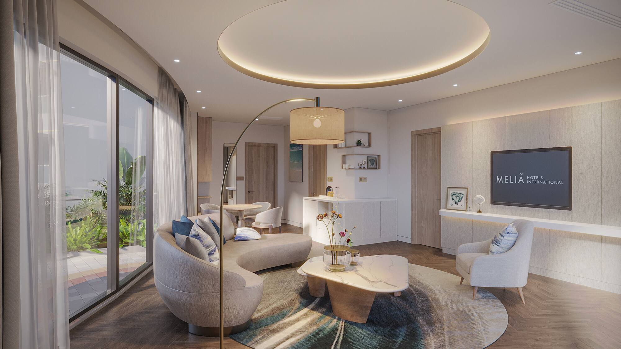 a living room with a round table and couches