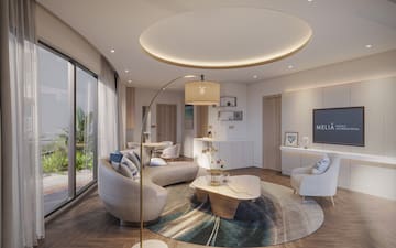 a living room with a round table and couches