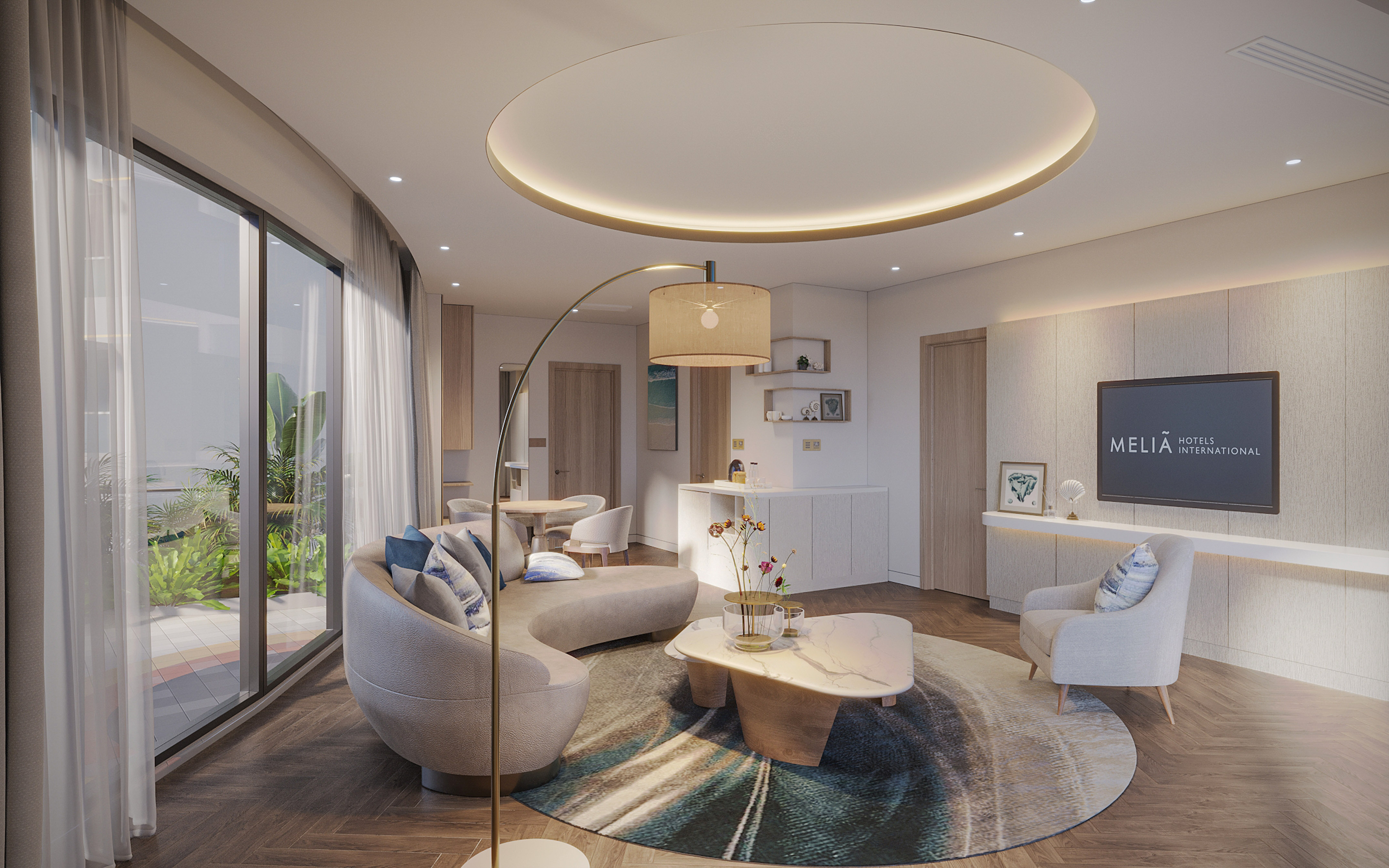 a living room with a round table and couches