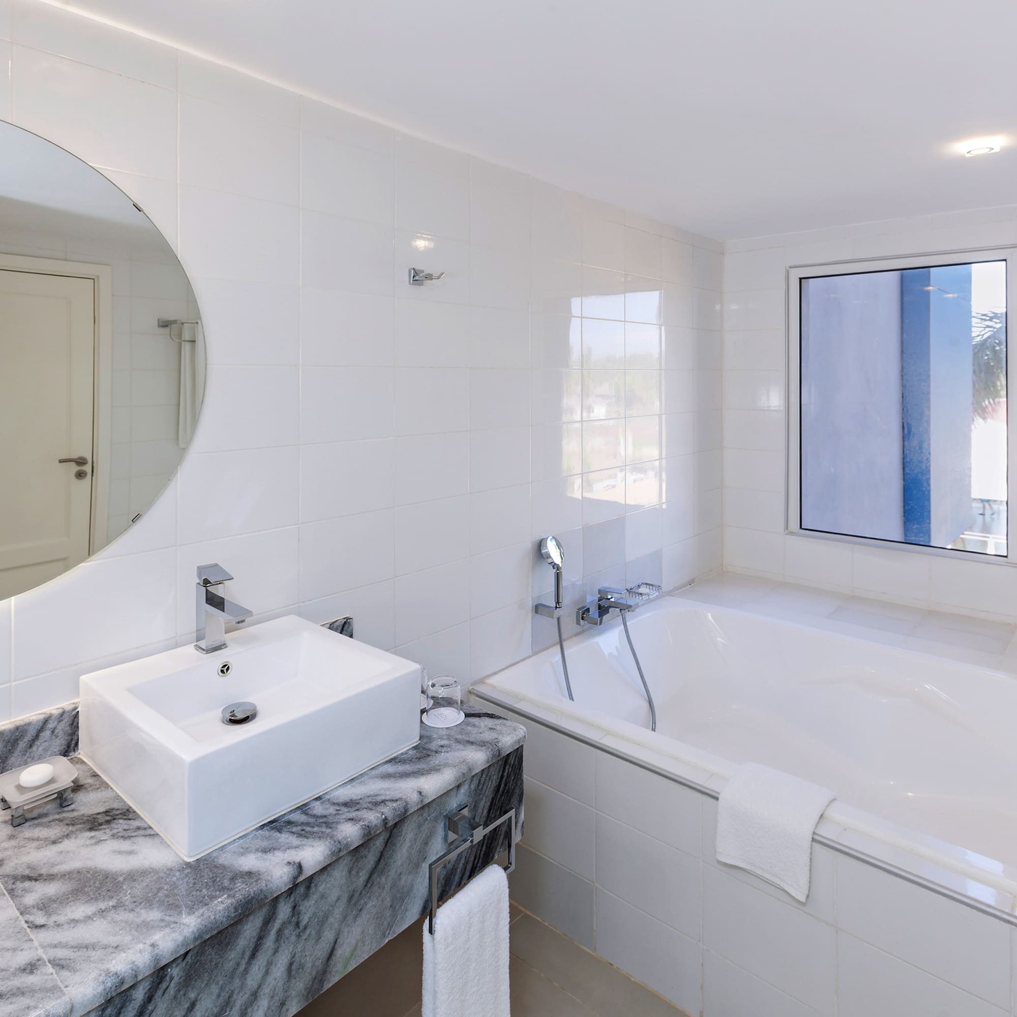 a bathroom with a sink and tub