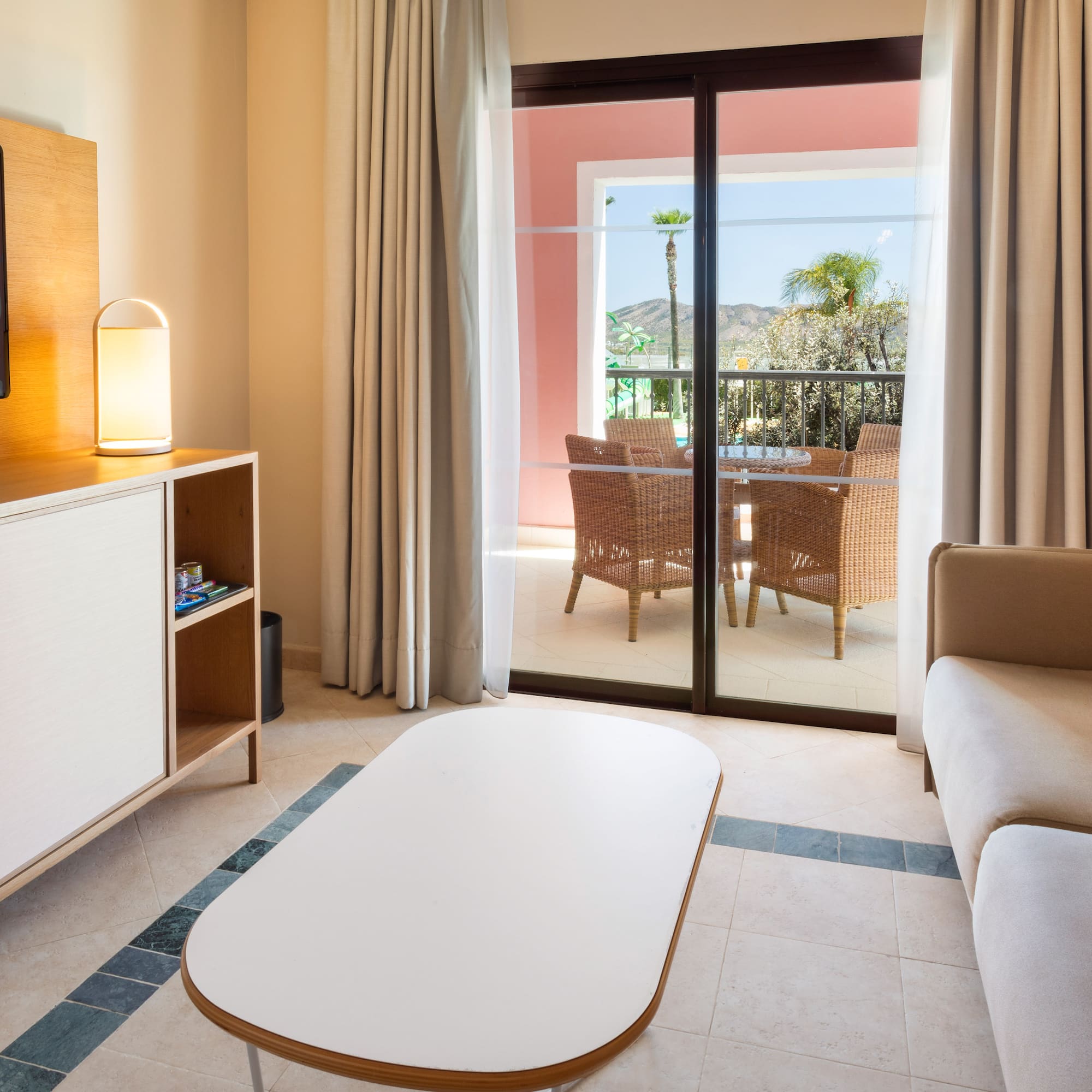 a living room with a television and a television set