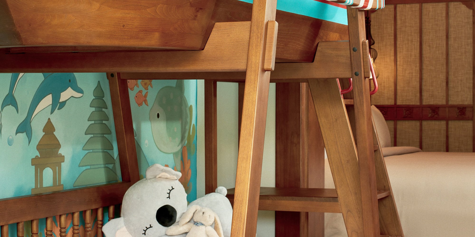 a bunk bed with a stuffed animal