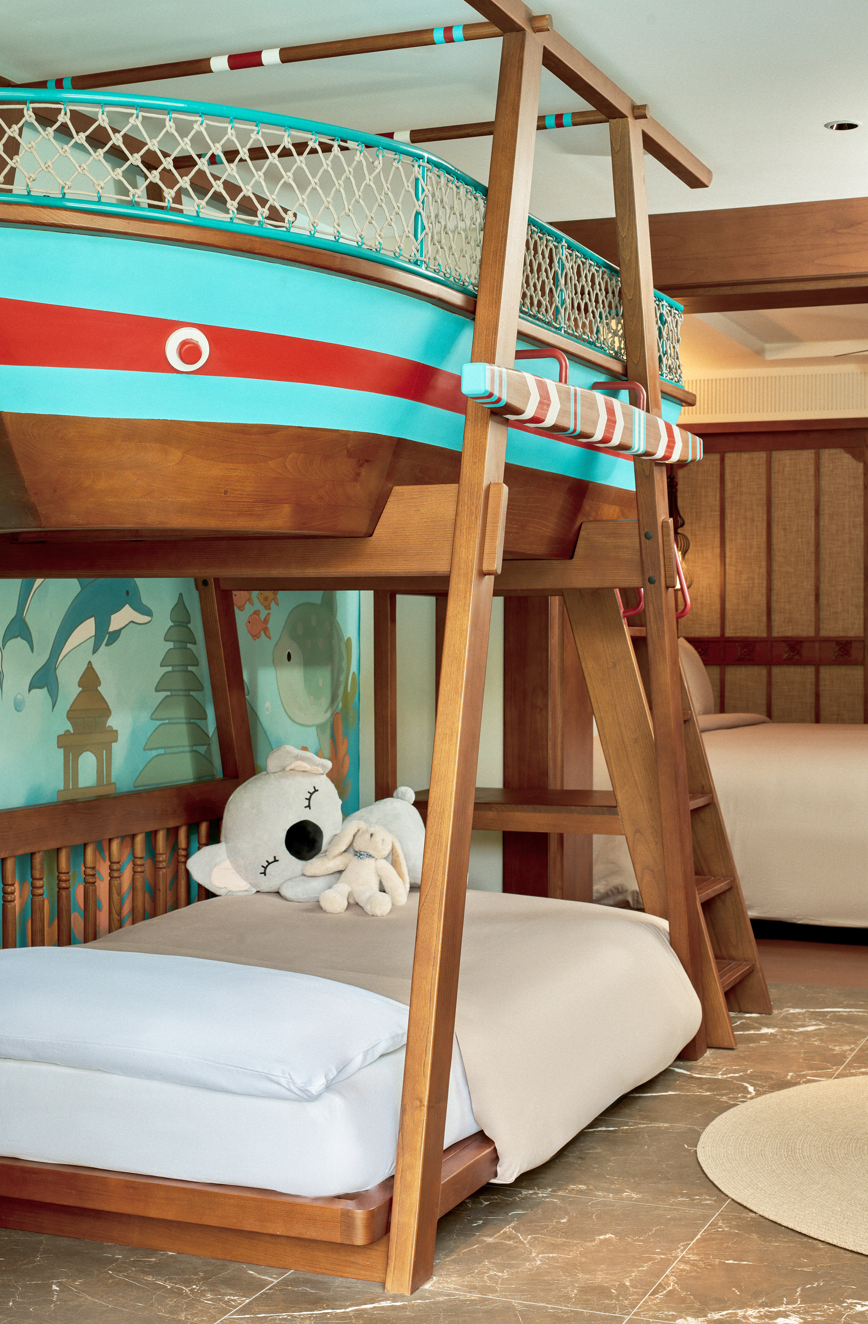 a bunk bed with a stuffed animal