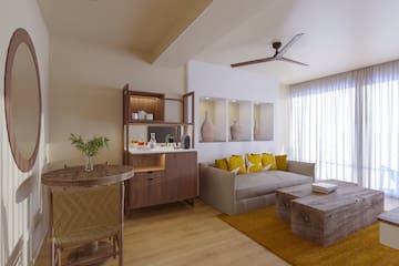 a living room with a couch and table