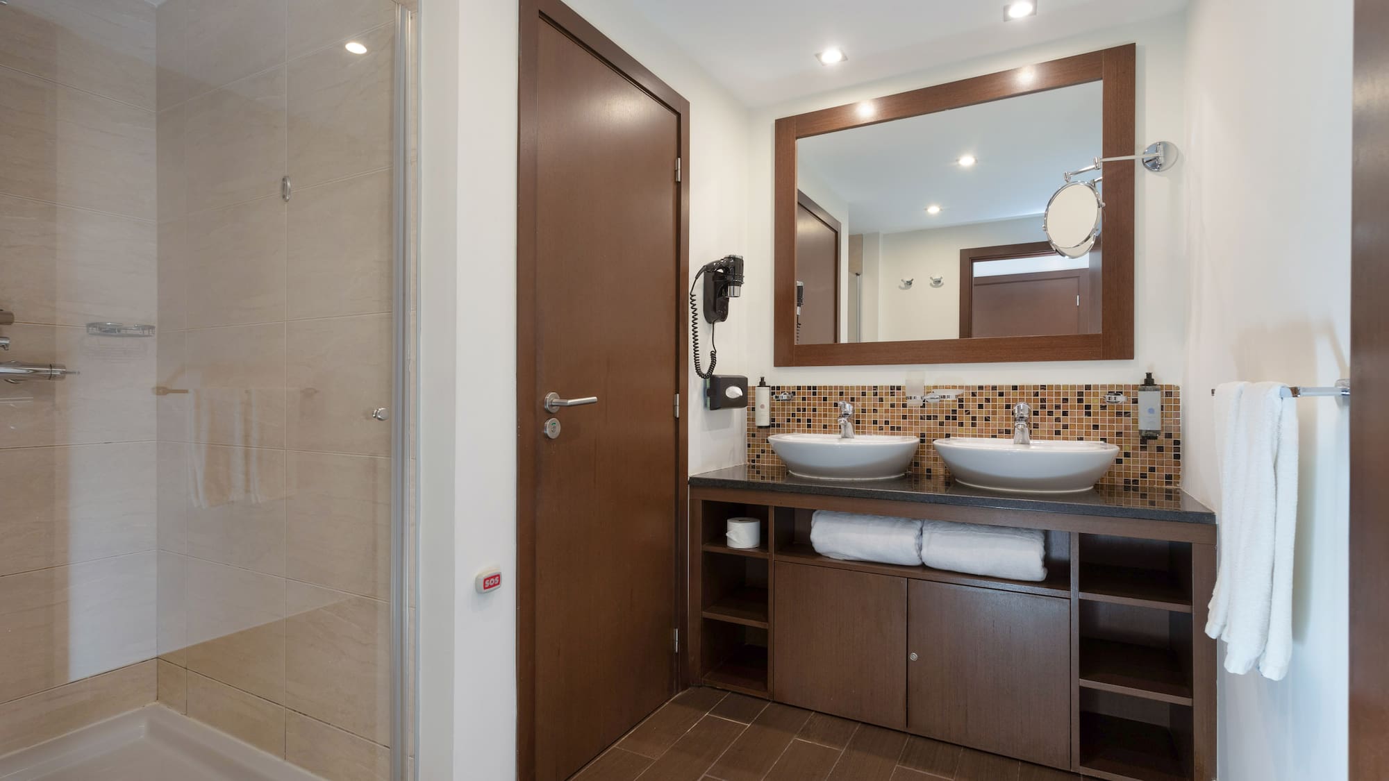 a bathroom with a mirror and sink