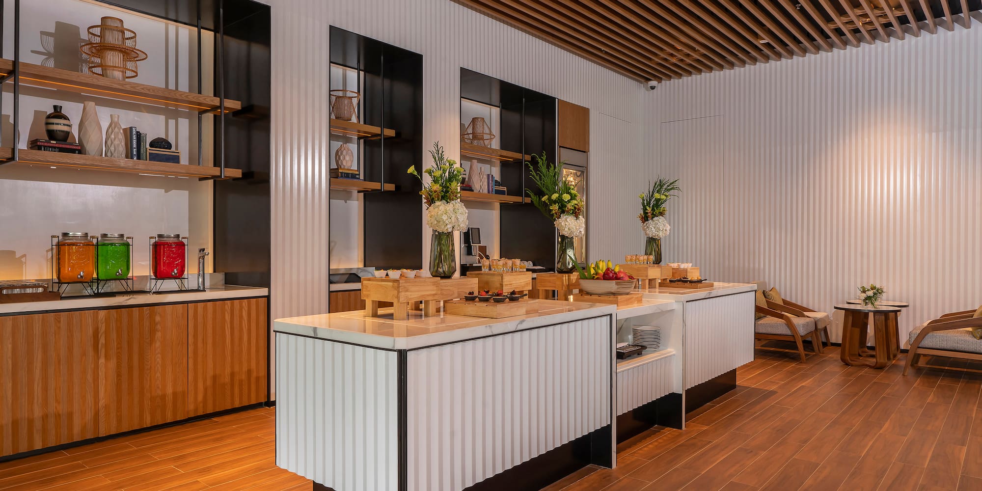 a kitchen with a wood floor and a wood floor