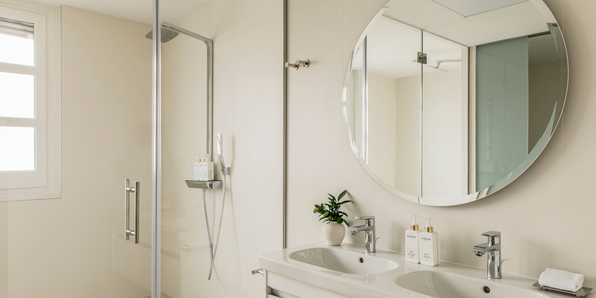 a bathroom with a mirror and sink