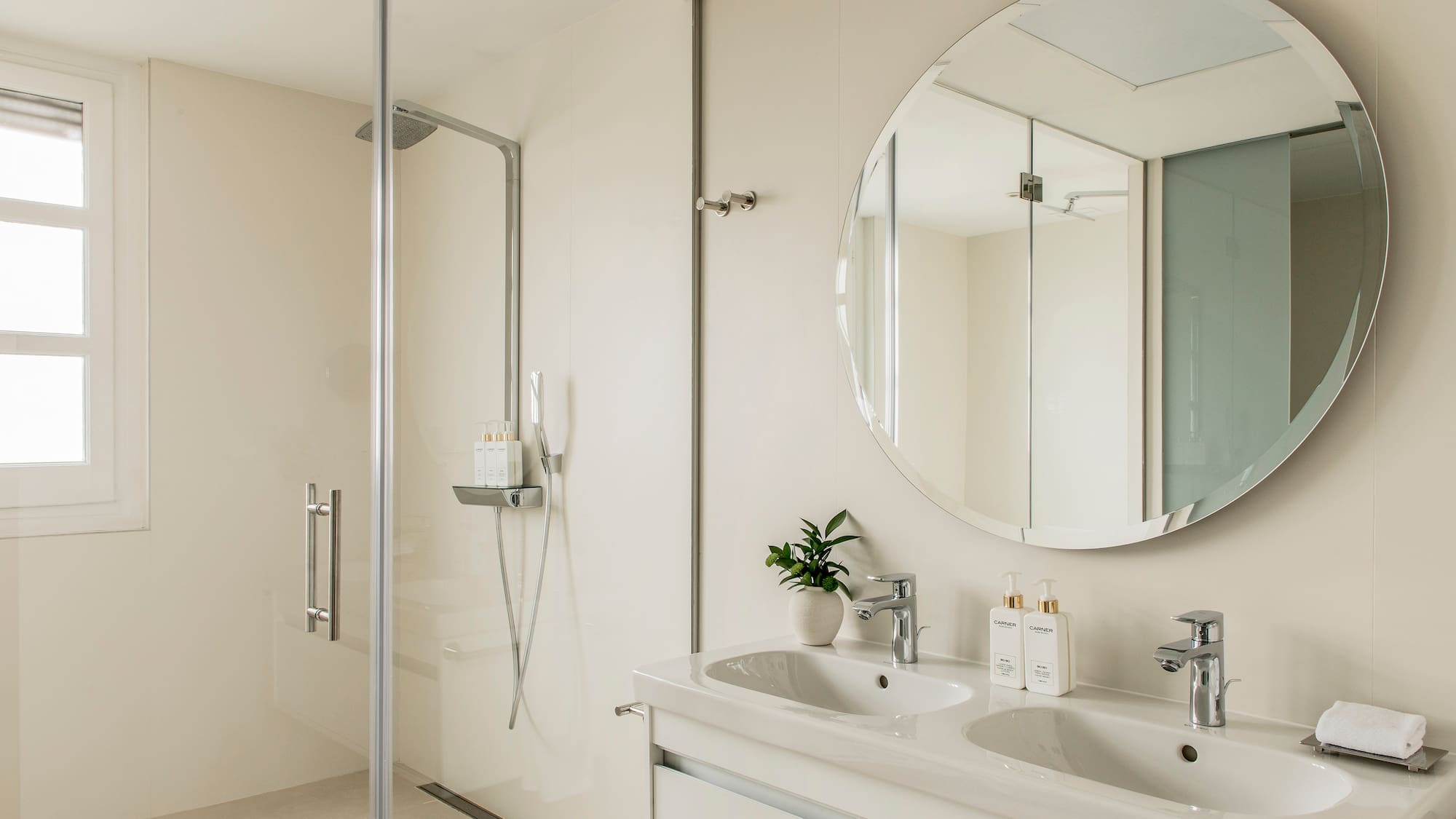 a bathroom with a mirror and sink