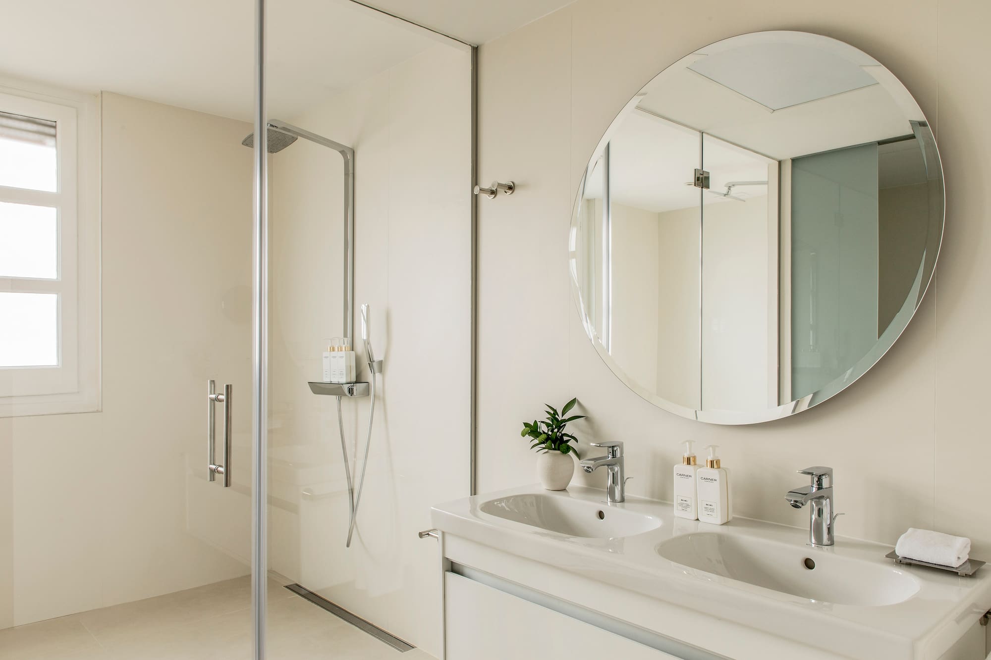 a bathroom with a mirror and sink