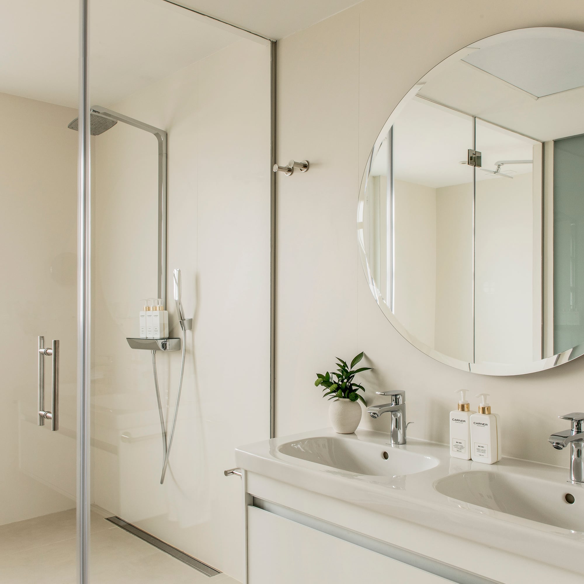 a bathroom with a mirror and sink