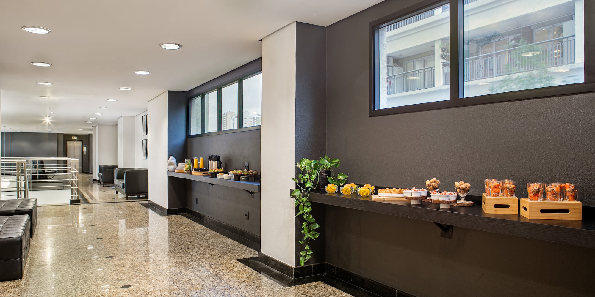a room with a black counter and a black chair