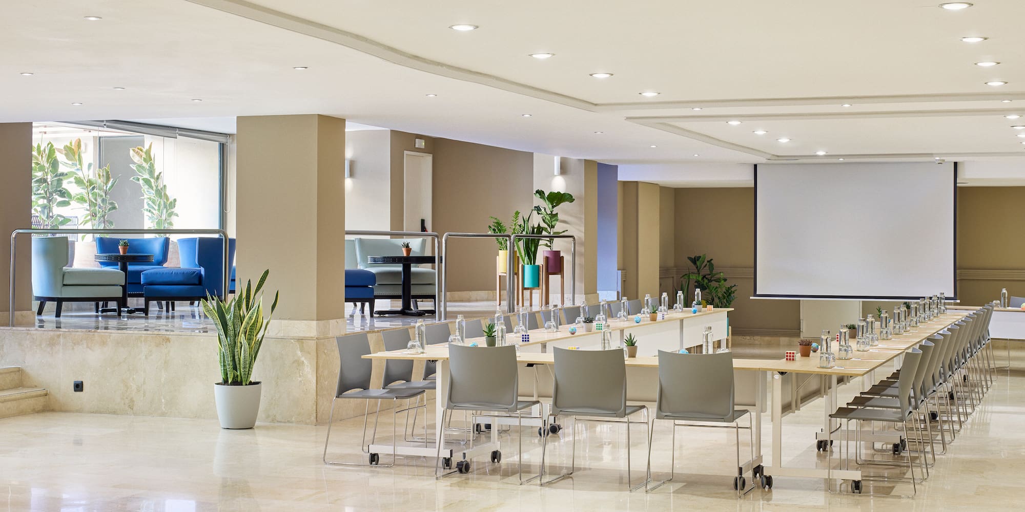 a room with a large table and chairs