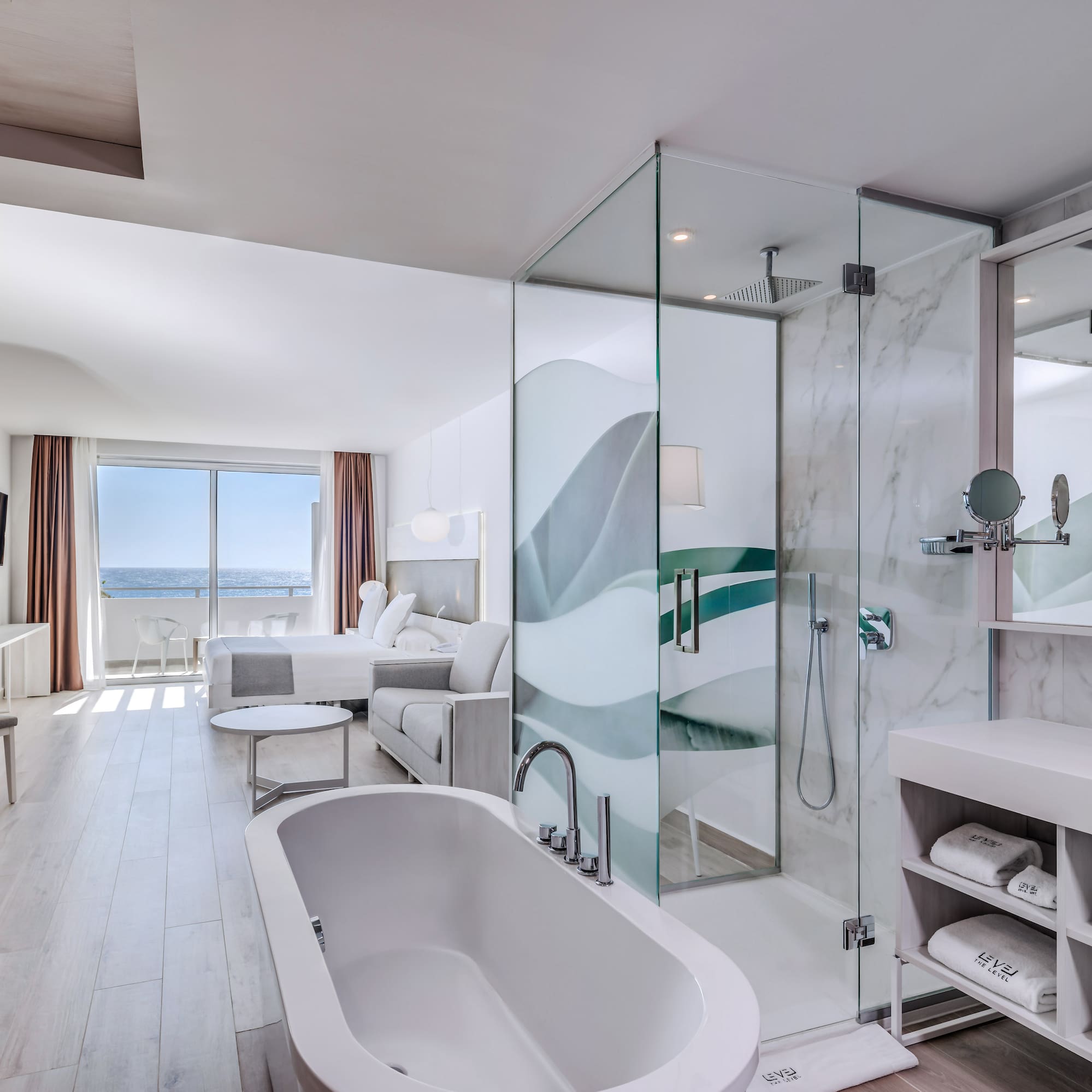 a bathroom with a tub and a shower