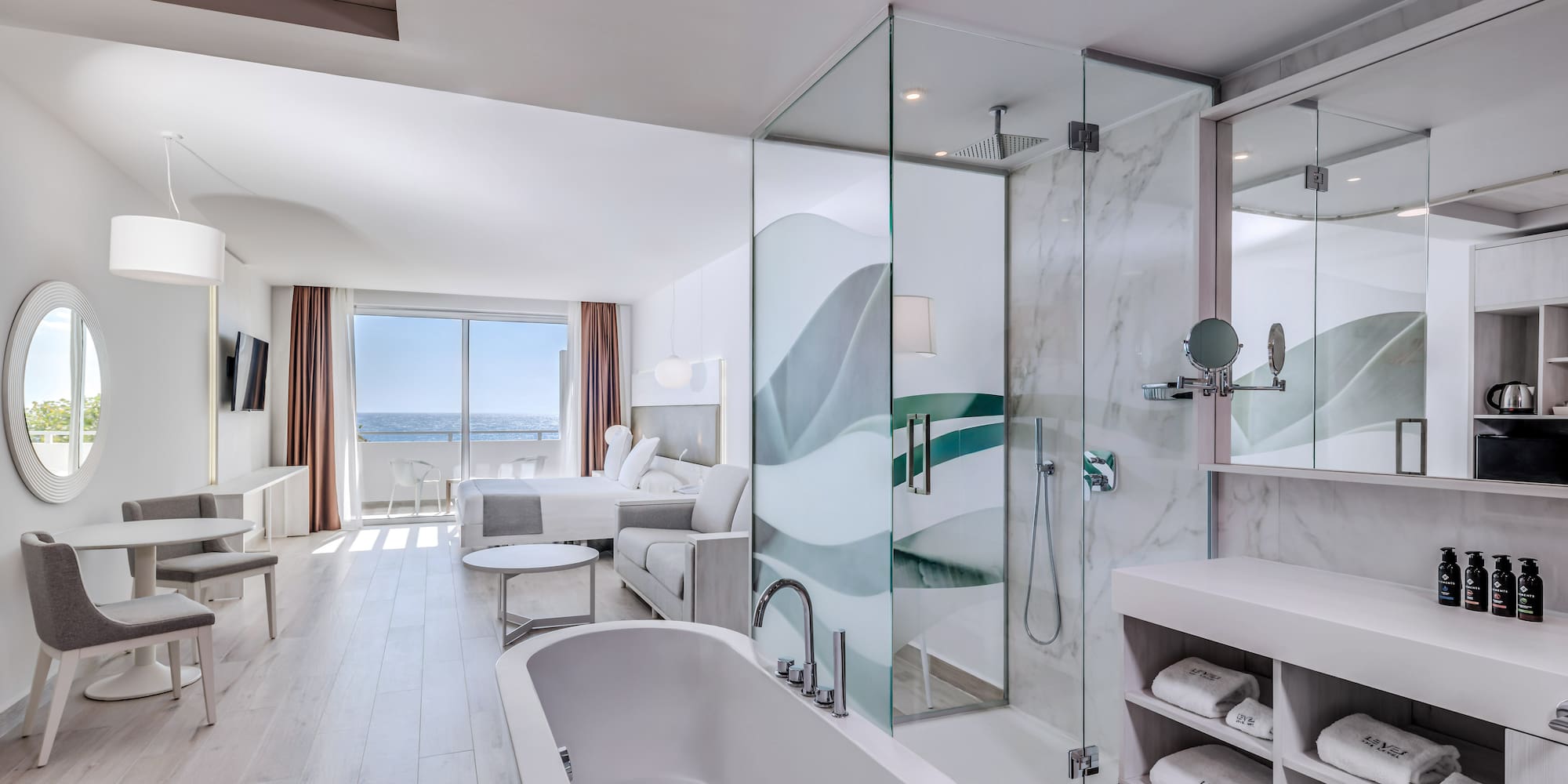 a bathroom with a tub and a shower