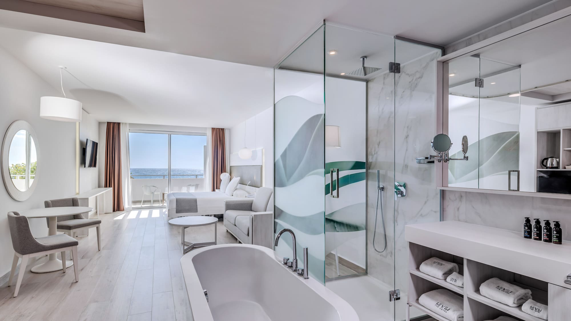 a bathroom with a tub and a shower