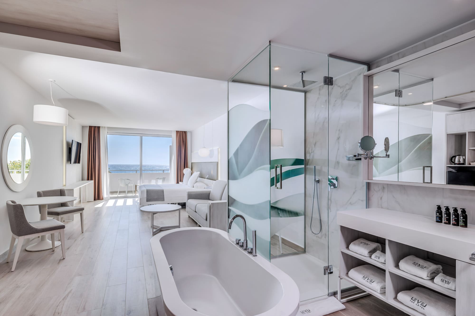 a bathroom with a tub and a shower