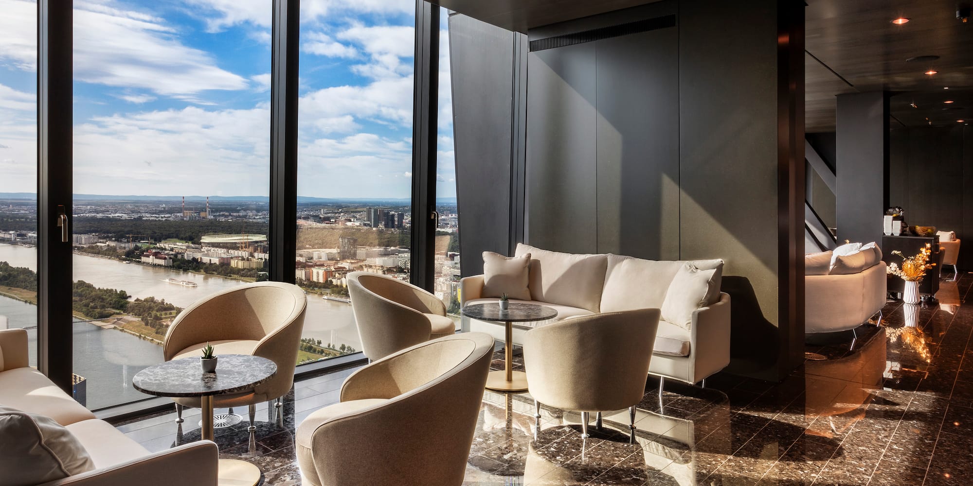 a room with a view of a city and a window