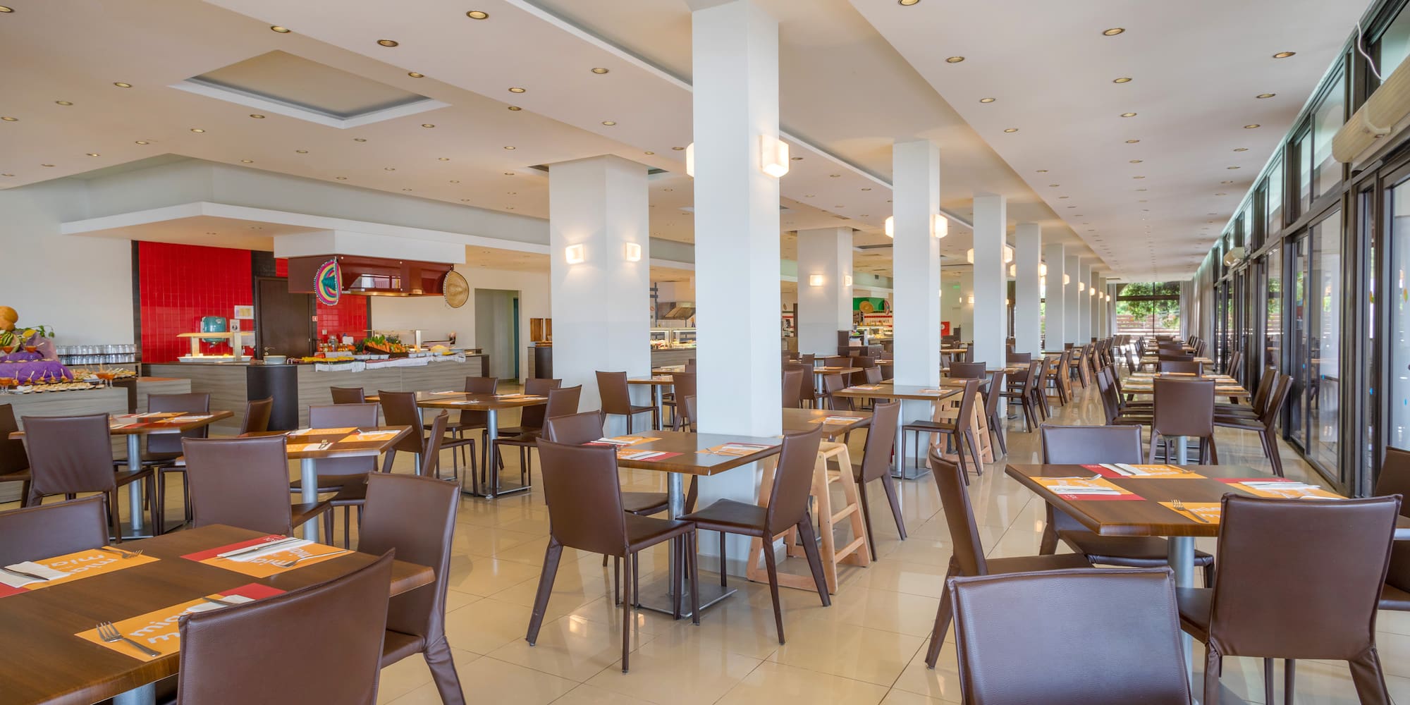 a large room with tables and chairs