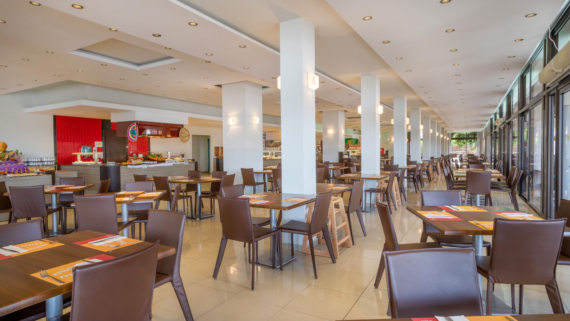 a large room with tables and chairs