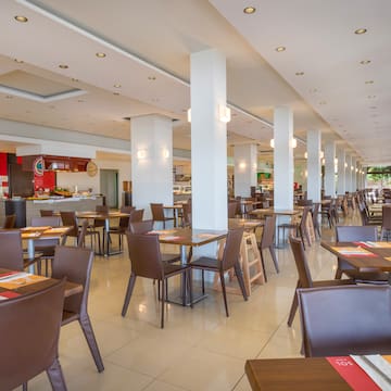 a large room with tables and chairs