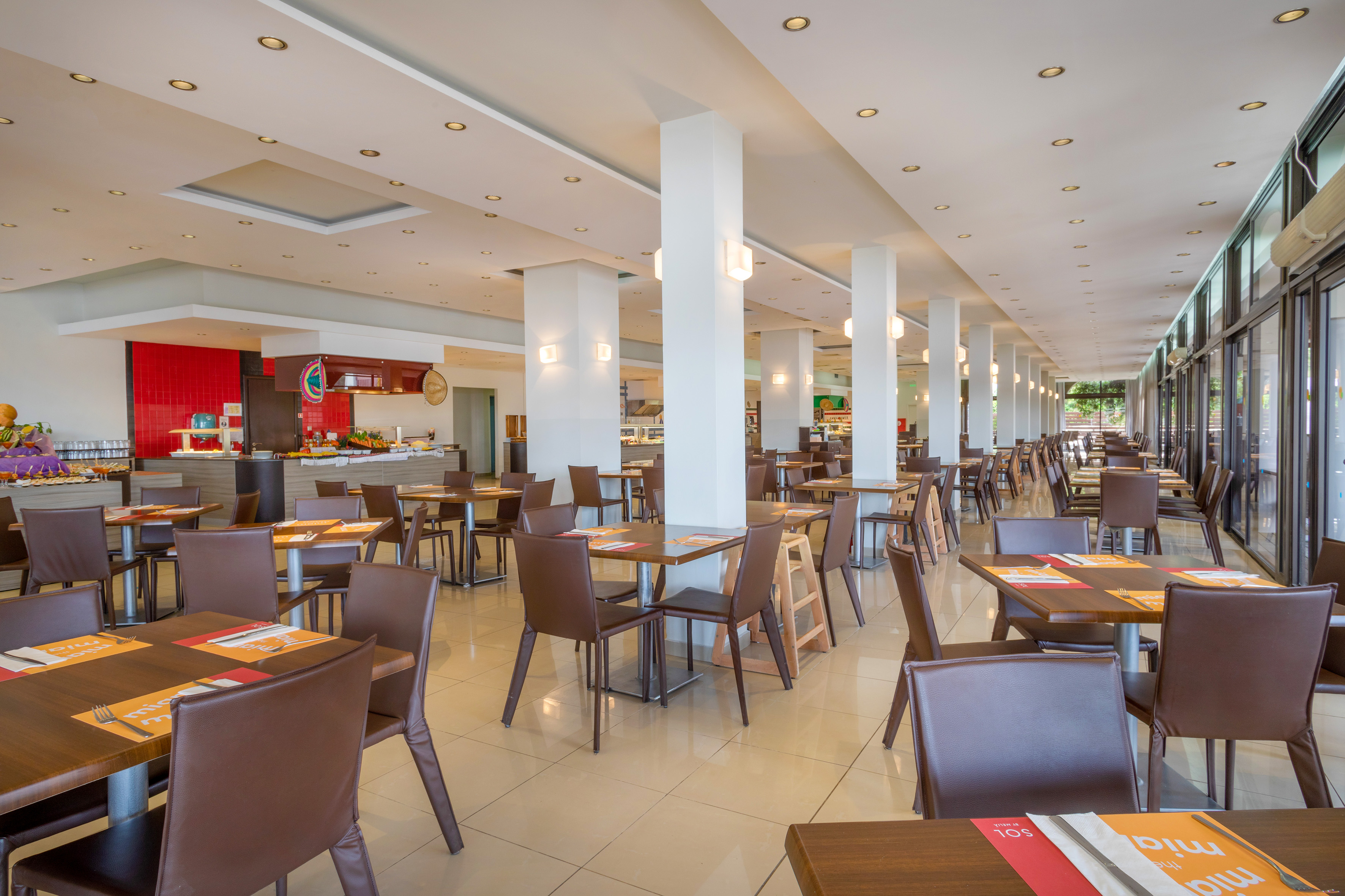 a large room with tables and chairs