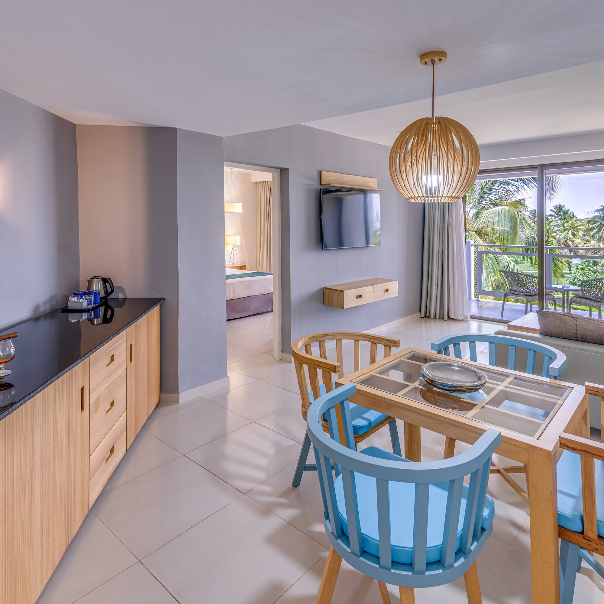 a room with a table and chairs