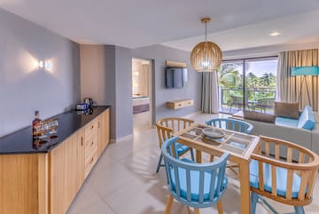 a room with a table and chairs