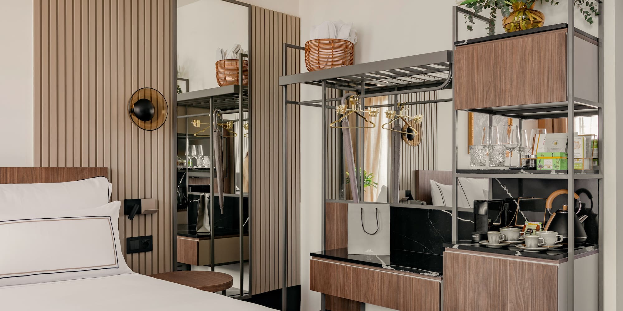 a room with a bed and a mirror