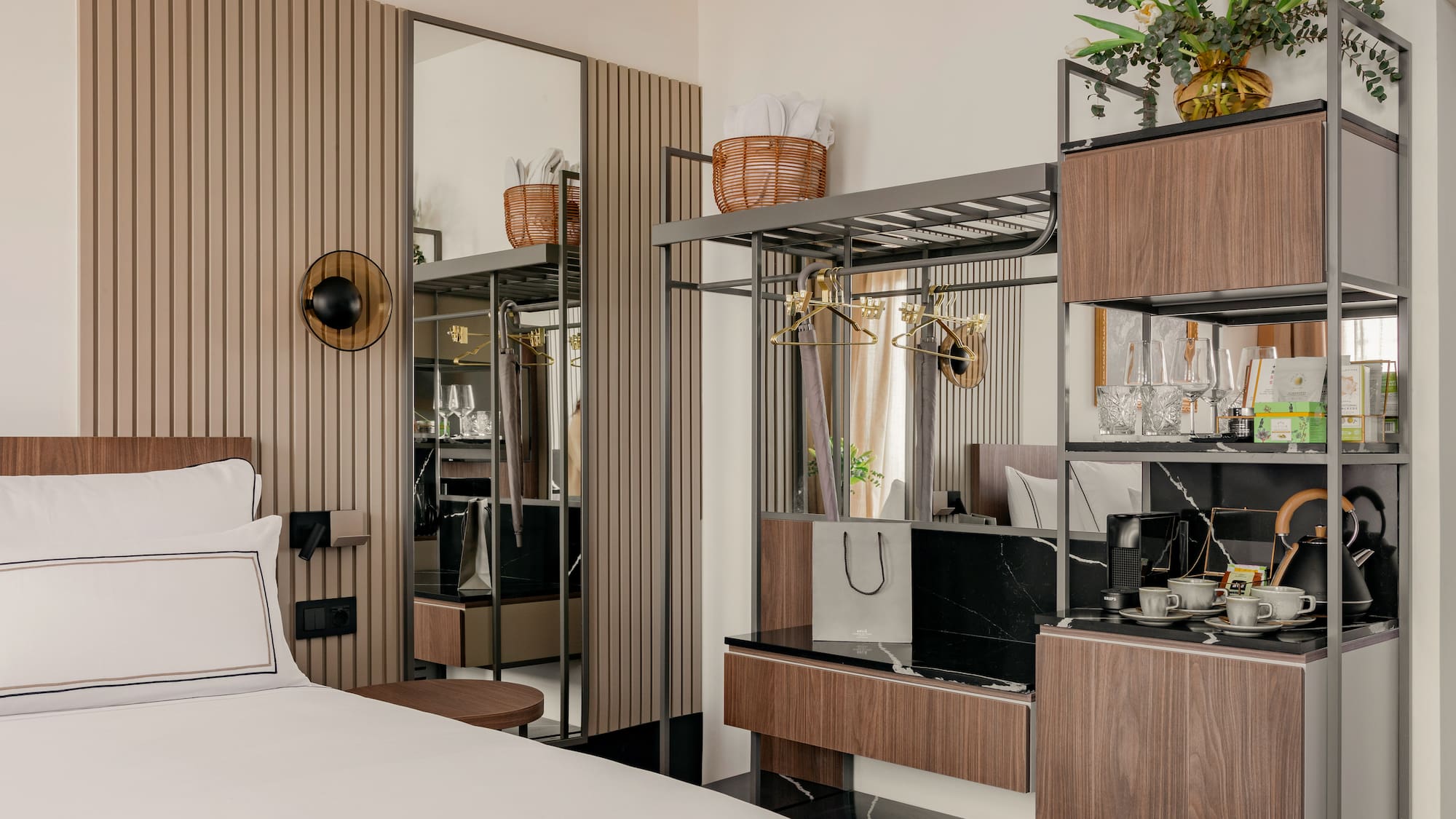 a room with a bed and a mirror