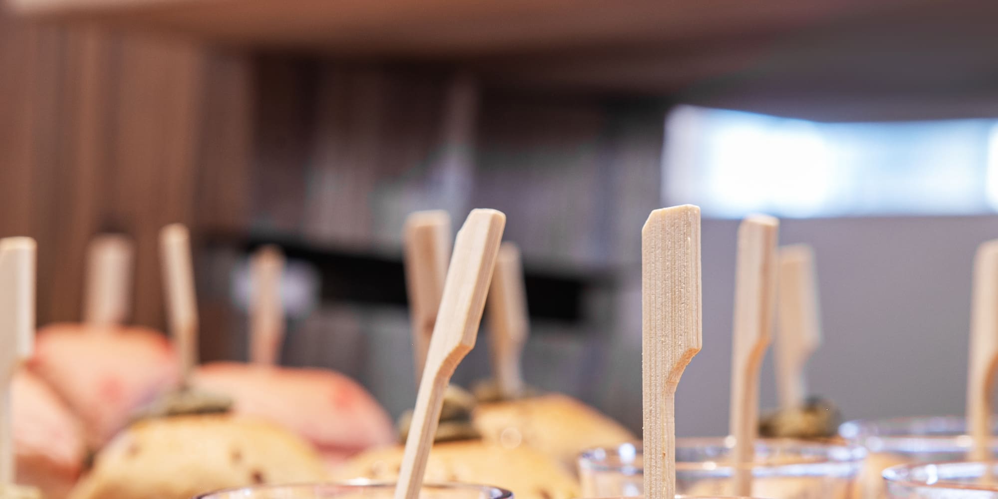 a group of small glasses with food on them