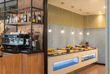 a counter with food and drinks on it