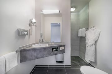 a bathroom with a sink and a toilet