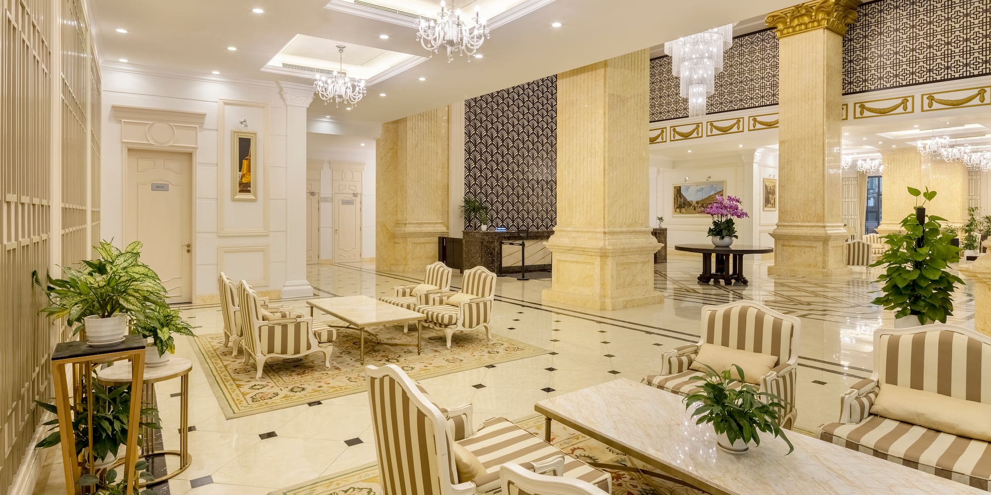 a large room with chairs and tables