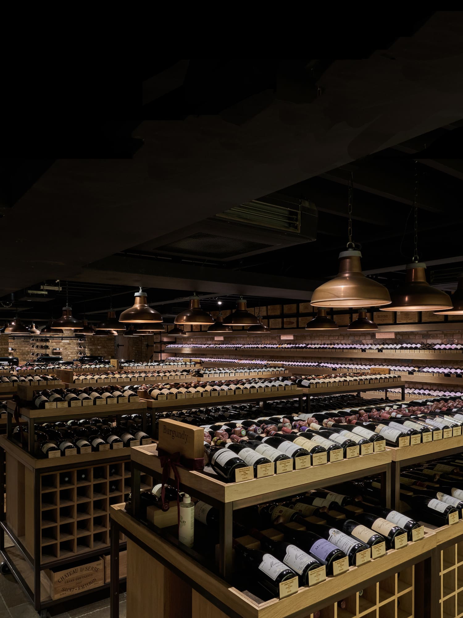 a room with shelves of wine