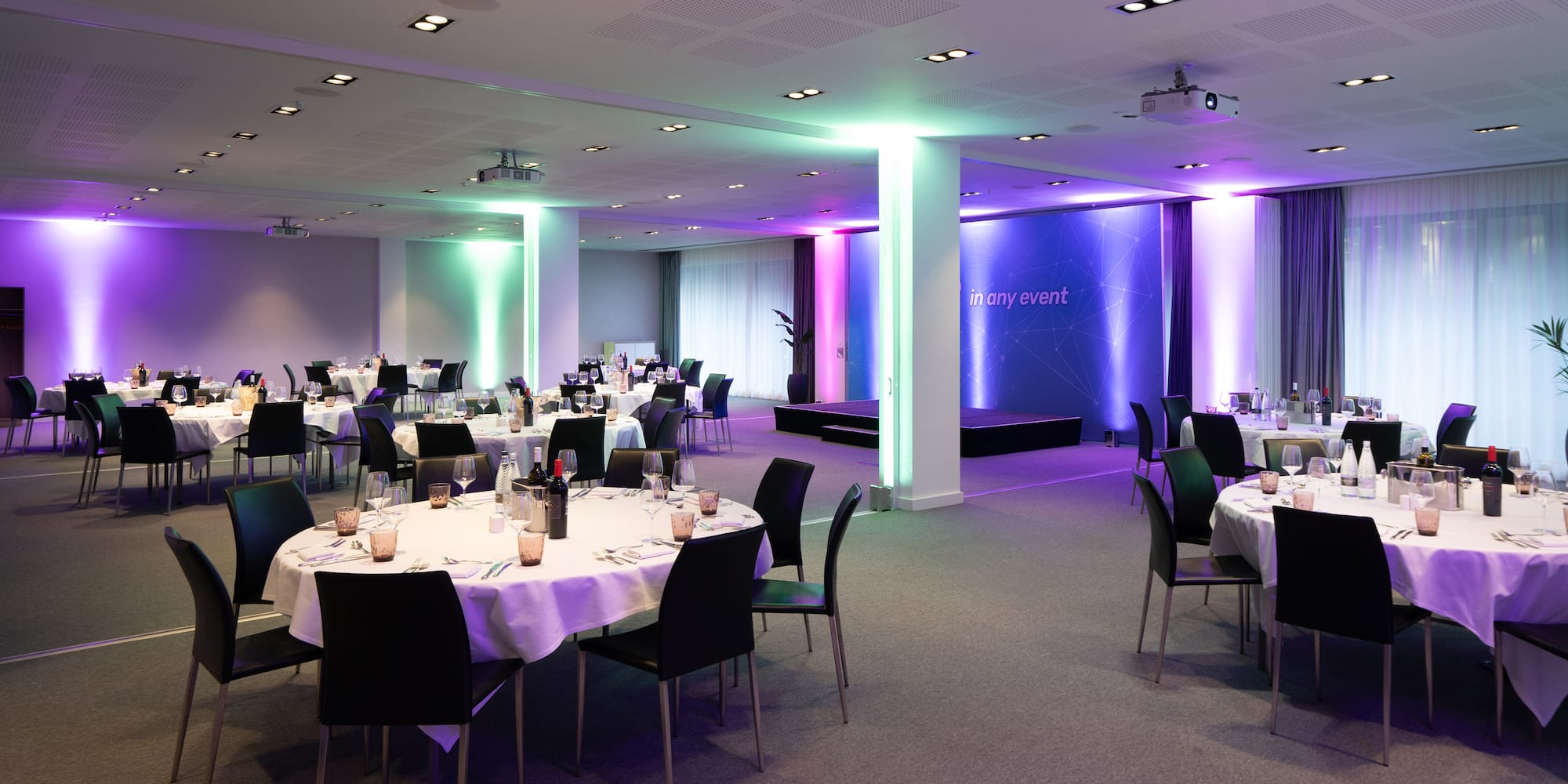 a room with tables and chairs