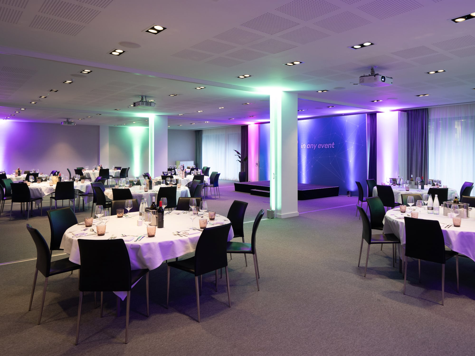 a room with tables and chairs