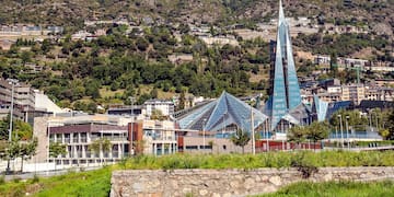 a building with a triangular shaped tower