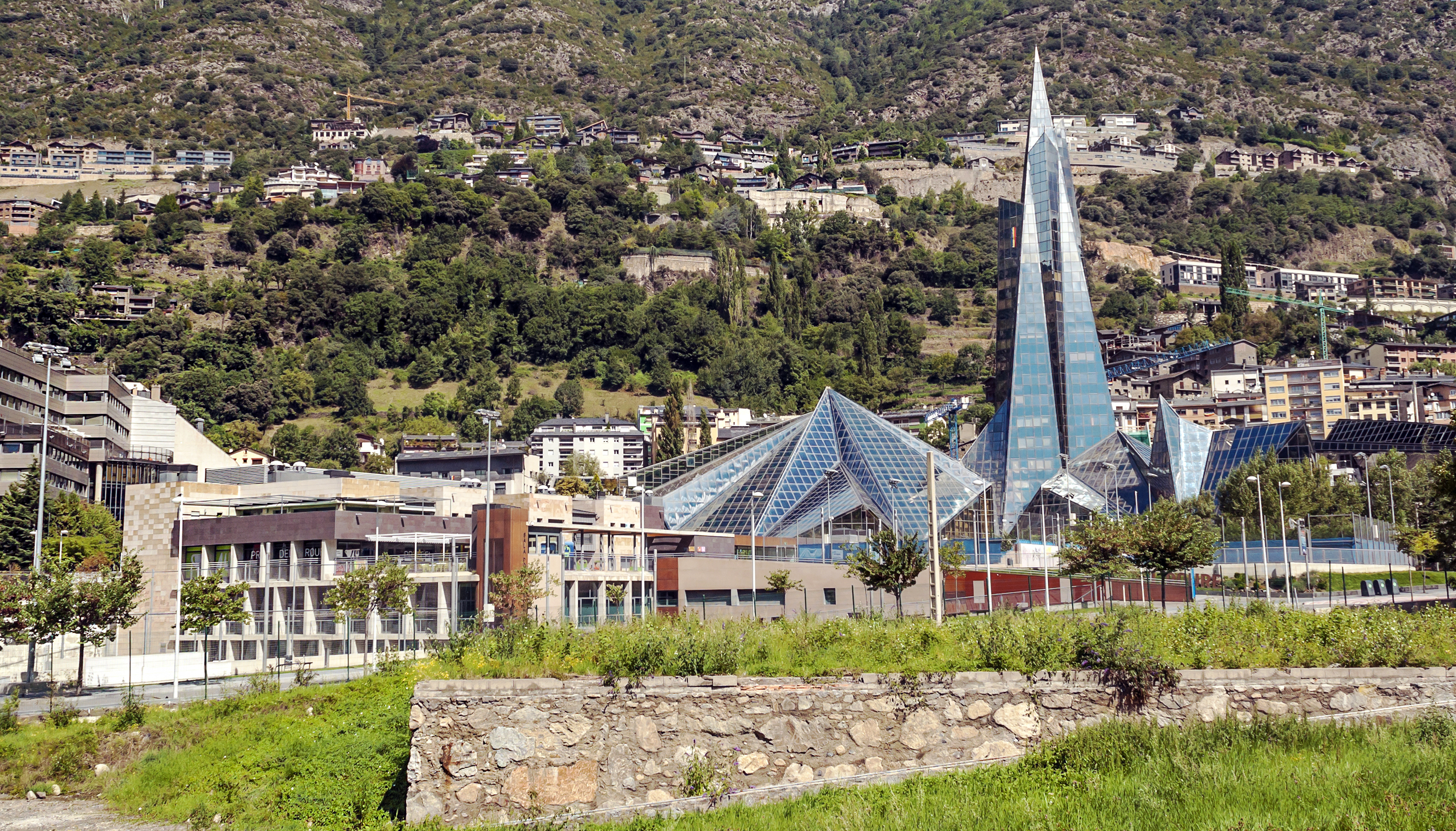 a building with a triangular shaped tower