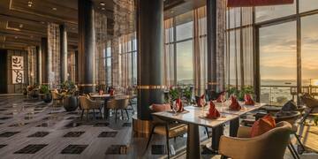 a restaurant with tables and chairs