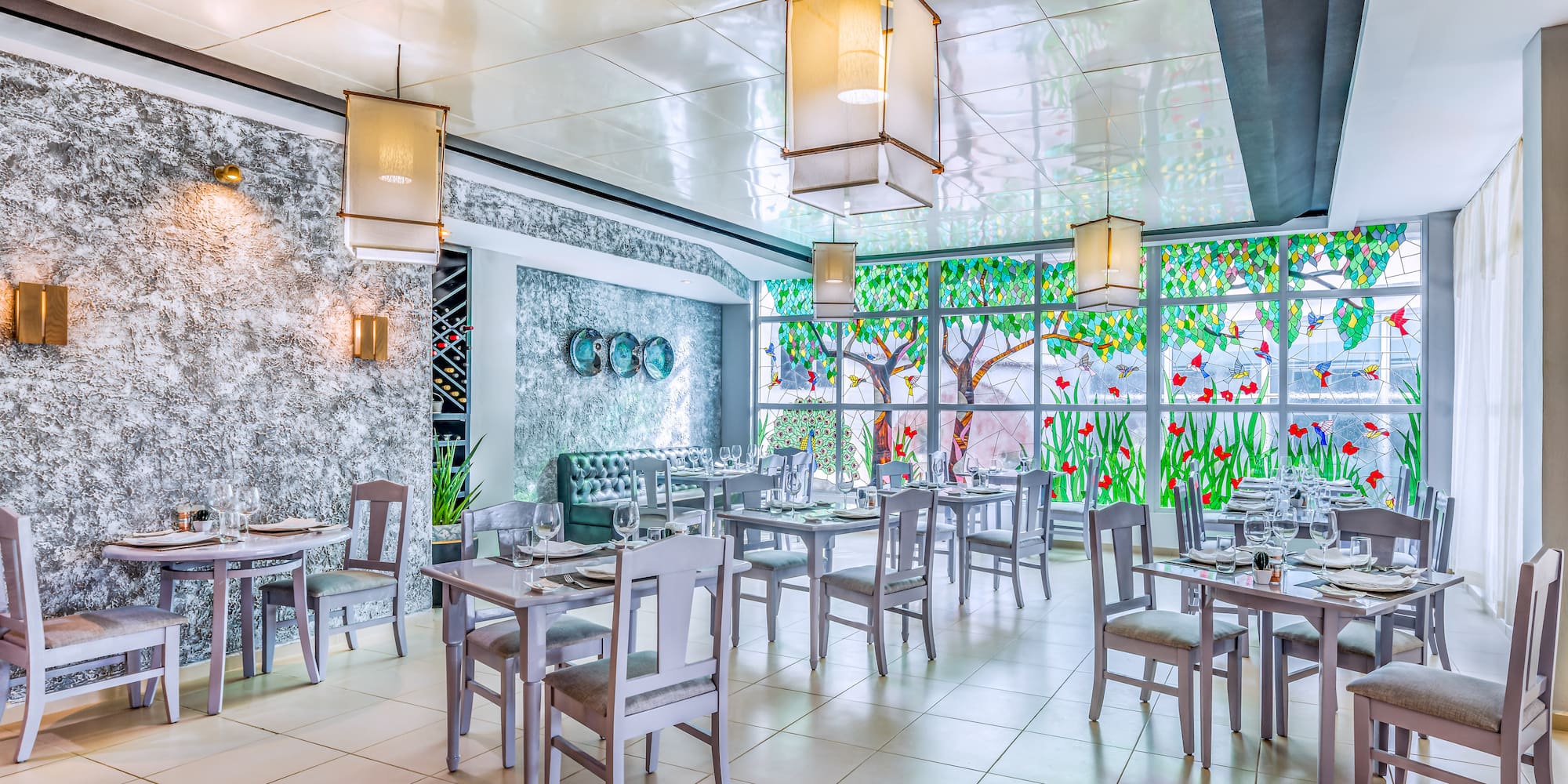 a restaurant with tables and chairs