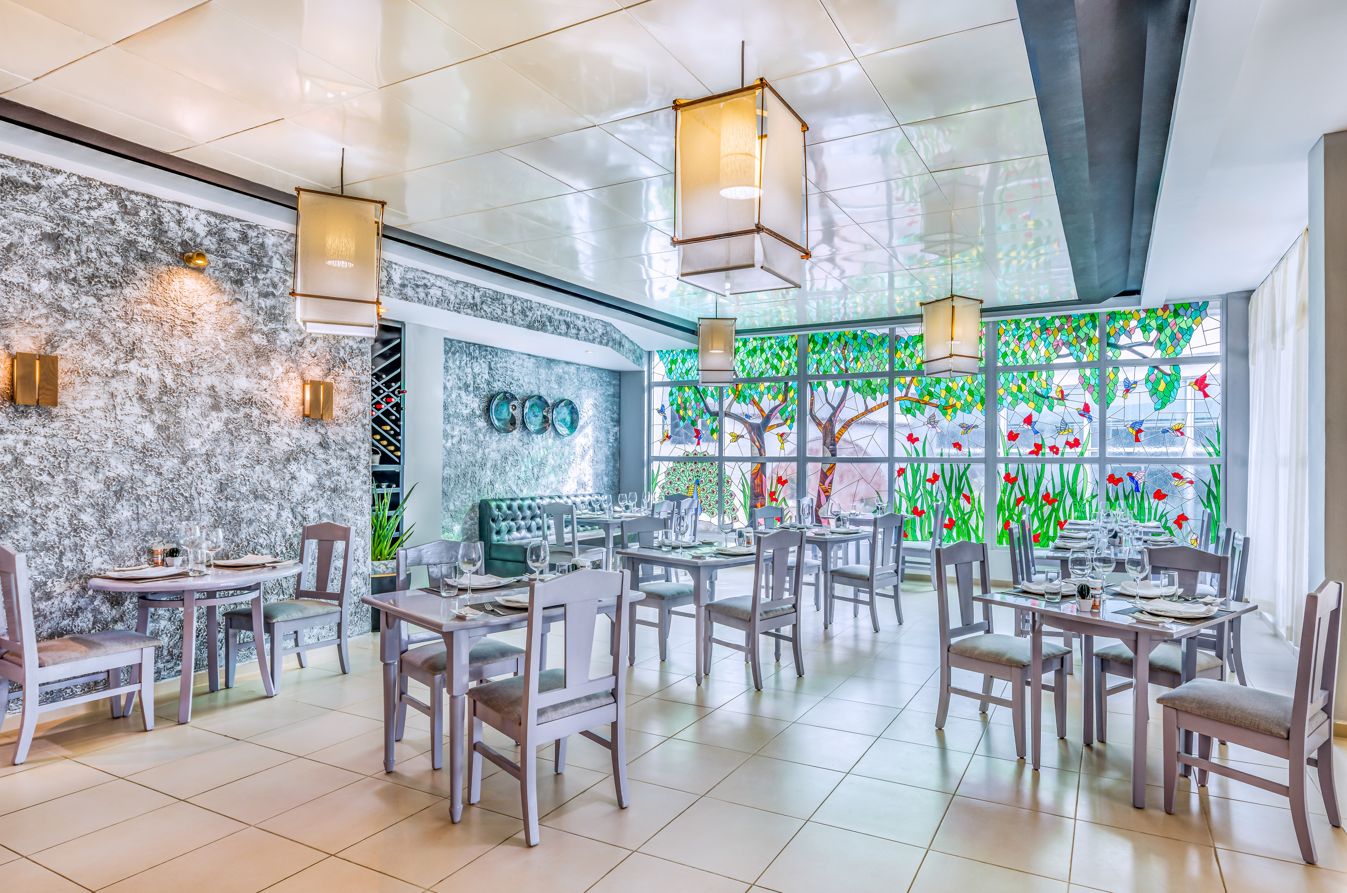 a restaurant with tables and chairs