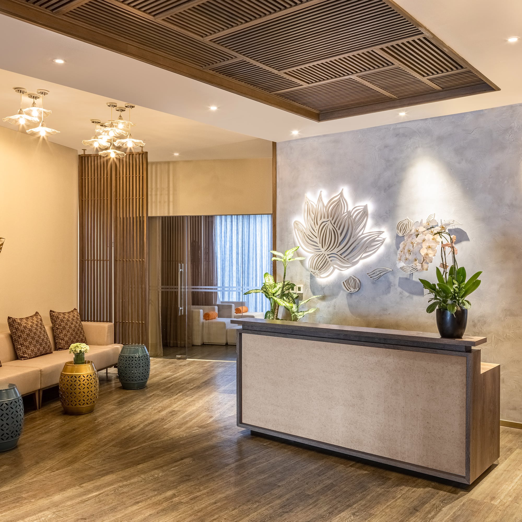 a lobby with a reception desk and a couch